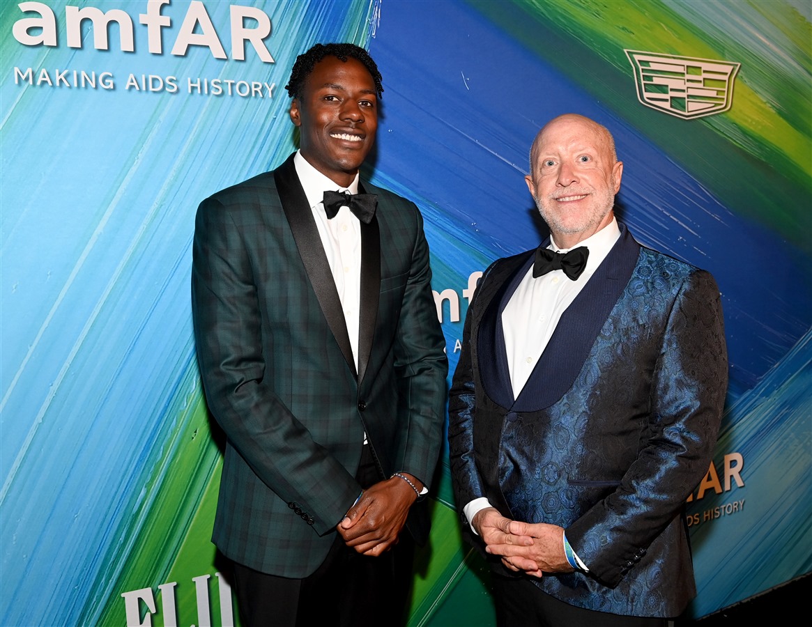 Lawrence Ojomo and amfAR Trustee Donald Dye