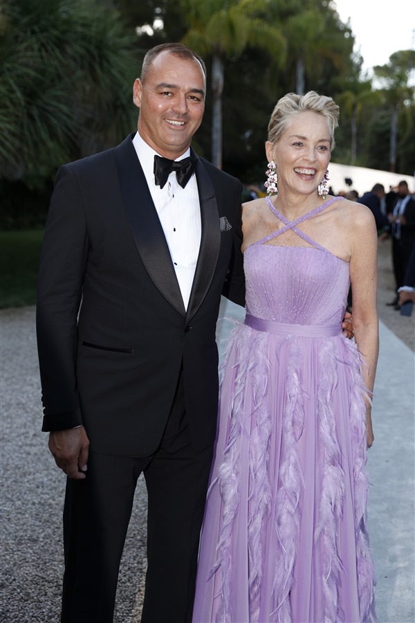 amfAR Global Fundraising Chair Milutin Gatsby and host Sharon Stone (Getty Images)