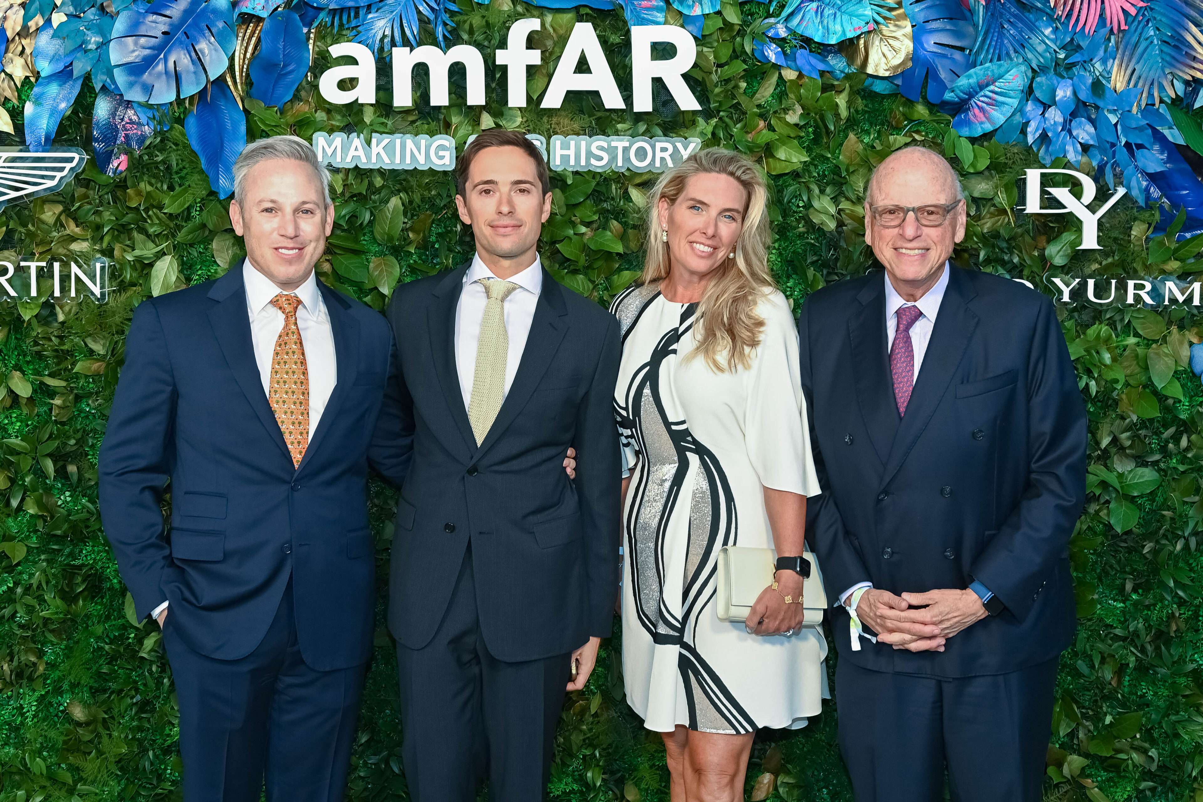 amfAR Trustee Michael Lorber (left) and guests
