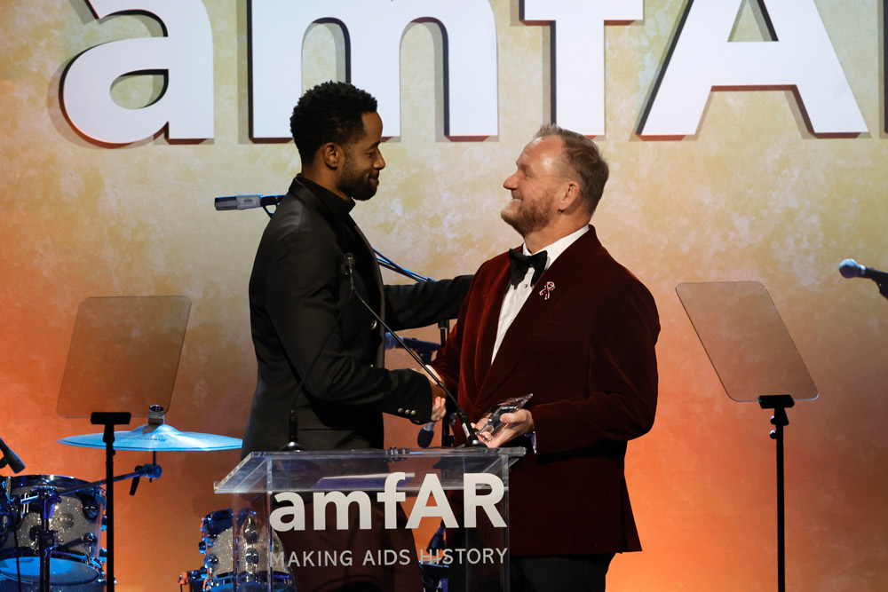 amfAR Trustee Jay Ellis and amfAR CEO Kevin Robert Frost share a moment at the amfAR Gala Los Angeles (photo: Getty Images for amfAR)