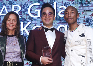 Rachel Lehmann, honoree Adrian Cheng, and Pharrell Williams