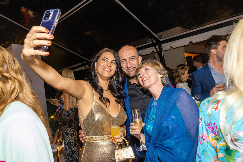 amfAR Trustee Dr. Mario Stevenson flanked by his wife Clessia and Dr. Rowena Johnston, amfAR VP and director of research (Photo: Capehart Photography)