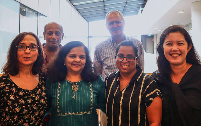 Members of the Biostatistics and Databases Program of the Kirby Institute, University of New South Wales, Sydney, Australia, including Dr. Azar Kariminia (front left), Prof. Matthew Law (back right), with Fogarty-IeDEA Mentorship Program trainee Smita Nimkar (front, second from left).