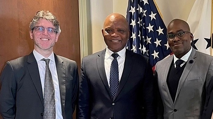 amfAR public policy staff, including Brian Honermann, Deputy Director (left), and Greg Millett, VP and Director of Public Policy (right), meet with Ambassador John Nkengasong