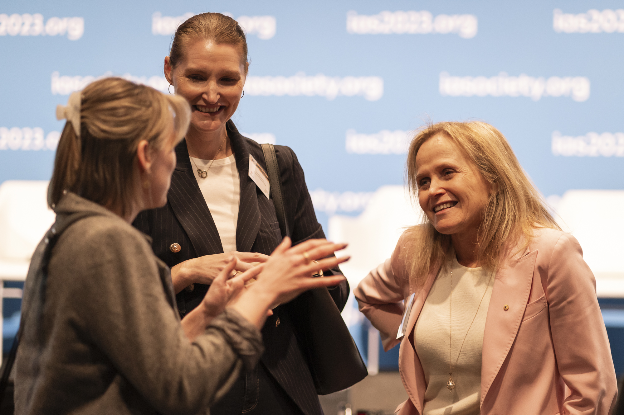 Prof. Sharon Lewin, IAS President and amfAR grantee, talks with attendees at the HIV Cure & Immunotherapy Forum