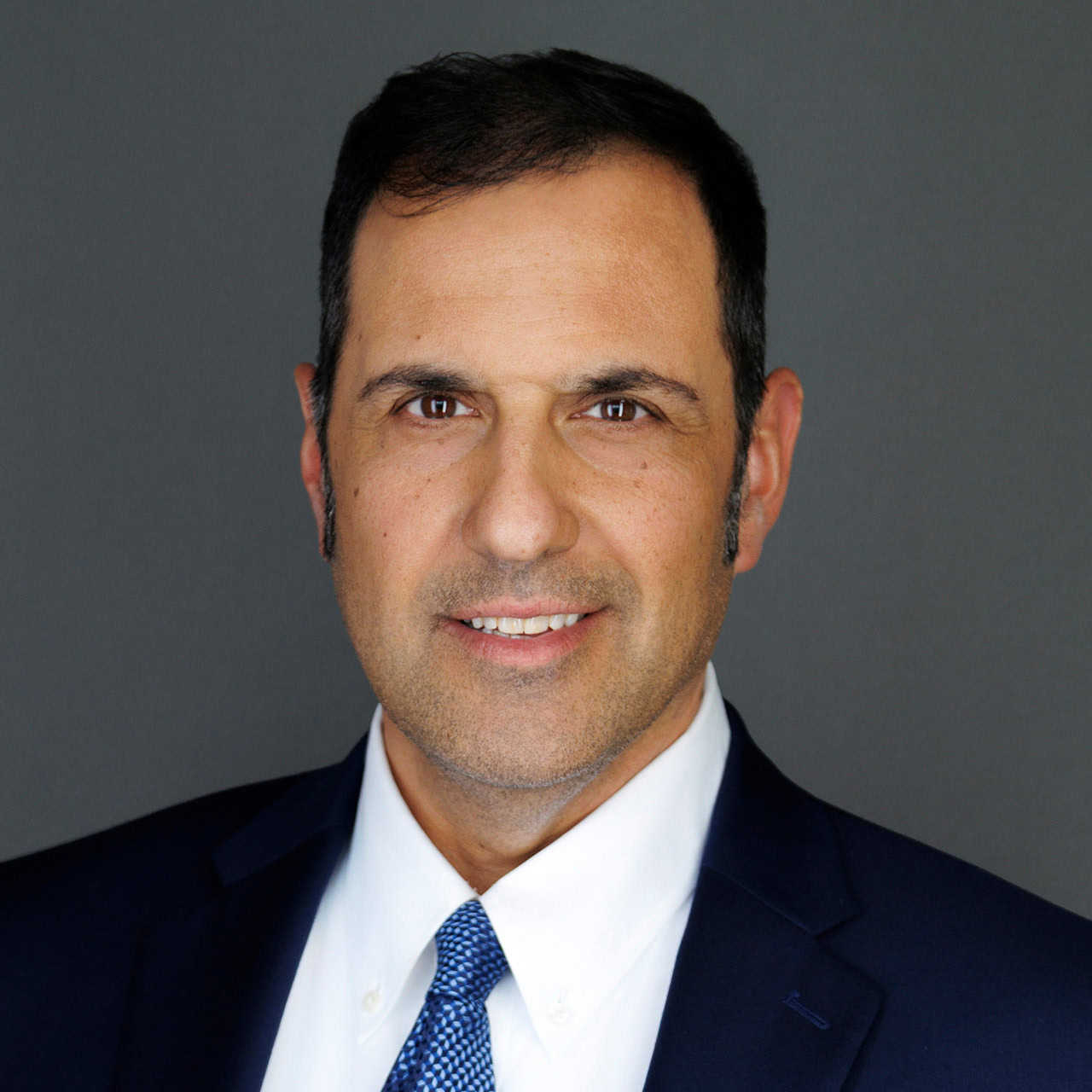 Headshot portrait of Andrea Gramatica, Ph.D., amfAR's Vice President of Research