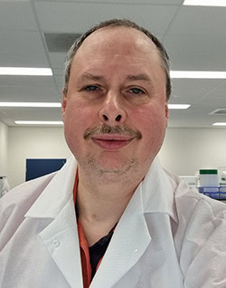 Portrait of Dr. Alexander Pasternak, an amfAR-funded HIV cure researcher