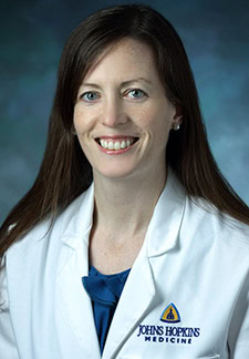 Portrait of Dr. Eileen Scully, researcher studying sex differences in HIV latency for amfAR cure research