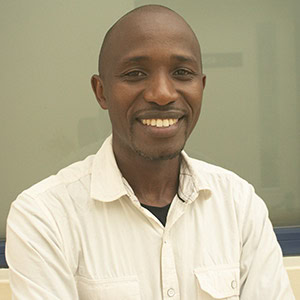 Portrait of researcher Edward Kankaka, featured in amfAR's HIV reservoir cure research