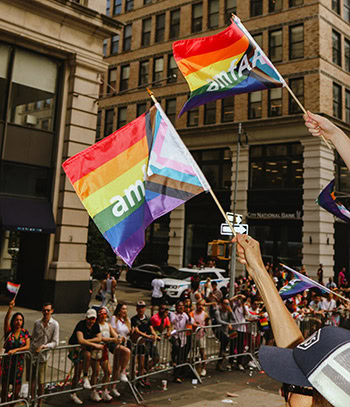 Photo from an amfAR Pride event honoring the queer community's role in founding amfAR