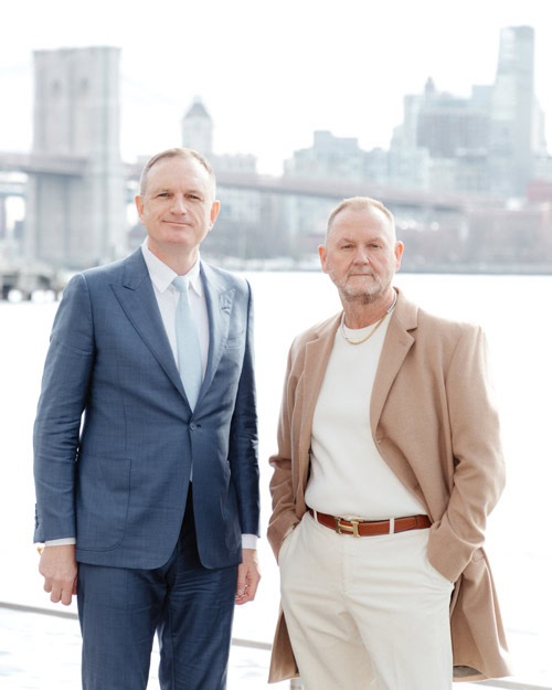 Kyle Clifford and outgoing CEO Kevin Robert Frost announcing amfAR's leadership transition