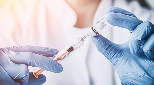Feature image for amfAR's coverage of the FDA-approved twice-yearly injectable HIV prevention drug lenacapavir