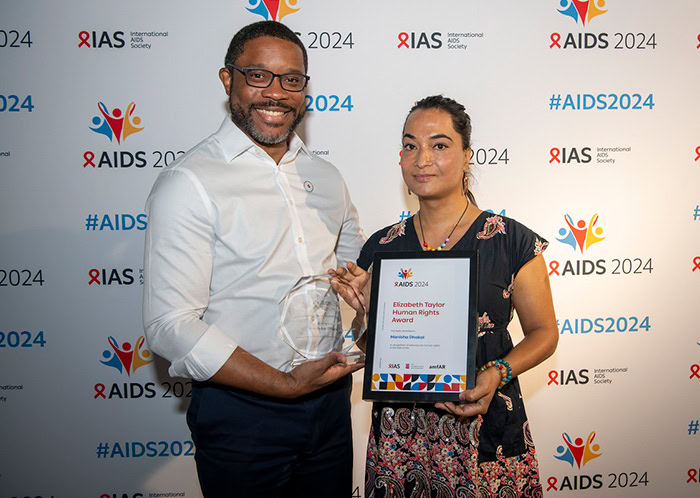 Manisha Dhakal with Robert Suttle and Steve Forrest at the International AIDS Society