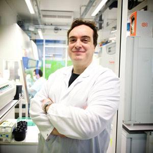 Portrait of HIV cure researcher Asier Saez-Cirion, featured in amfAR's 2023 research timeline