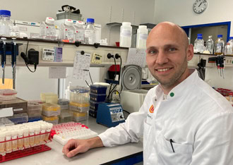 Dr. Steven de Taeye in his lab, researching antibodies that restrict HIV growth