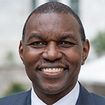 Portrait of Dr. Thumbi Ndung'u of the Africa Health Research Institute, researching HIV cure strategies across subtypes