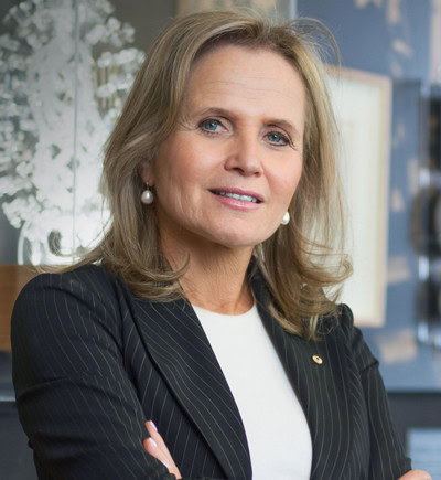 Portrait of Dr. Sharon Lewin of the University of Melbourne accompanying her quote on amfAR's risk-taking