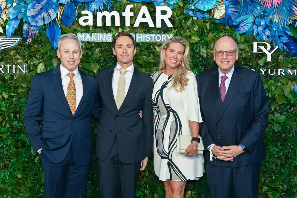amfAR Trustee Michael Lorber (left) and guests