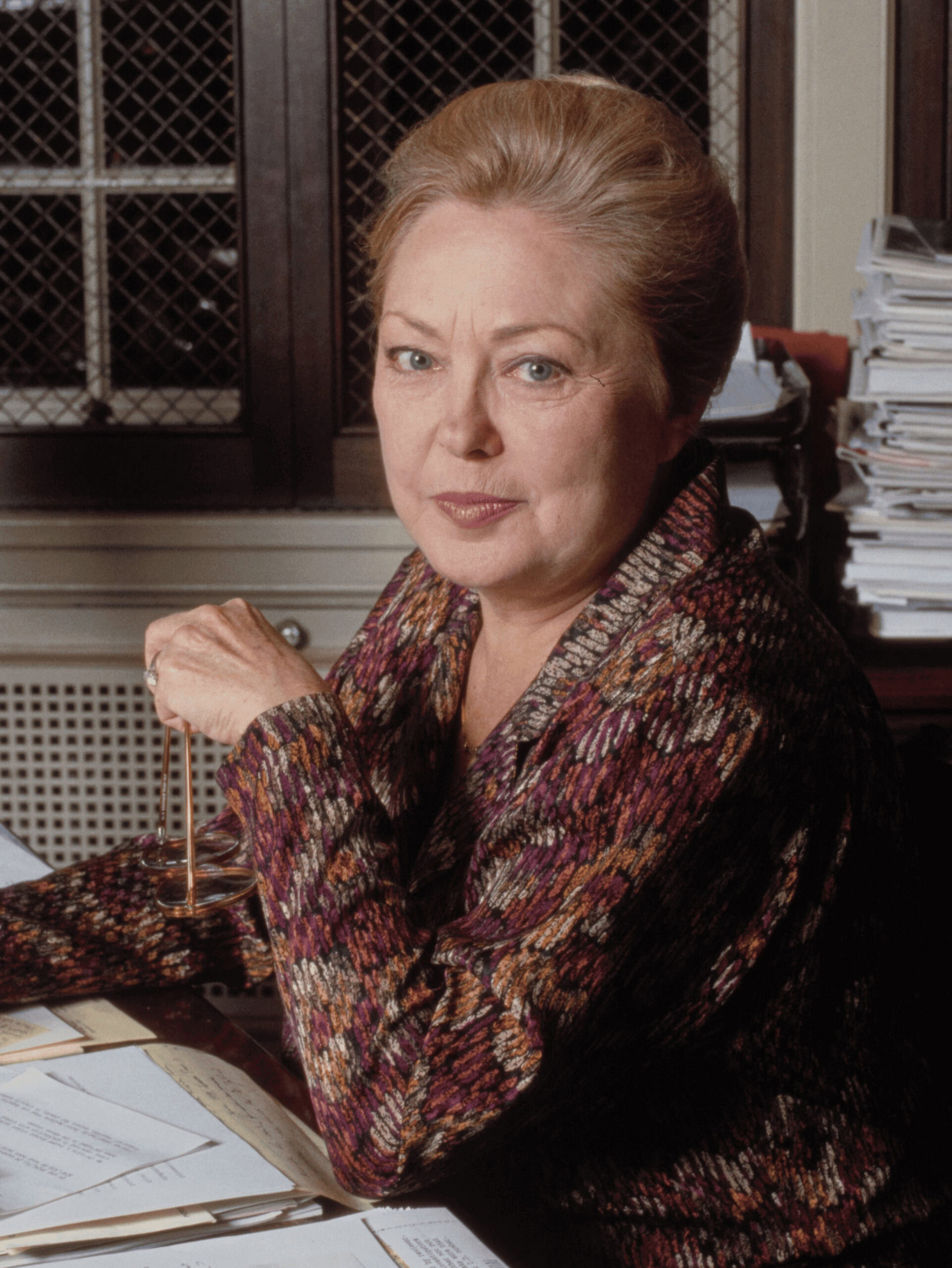 Portrait of Dr. Mathilde Krim, amfAR Founding Chairman, beside her quote on giving