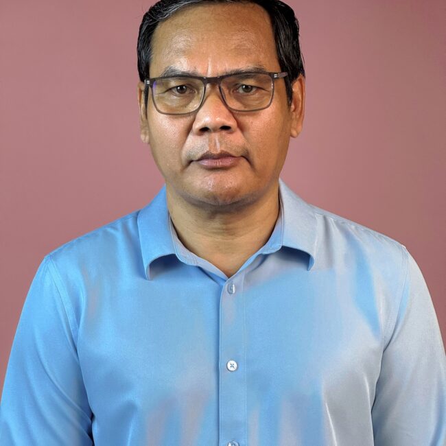 Portrait of Dr. Narom Prak, Deputy Chief of Cambodia's National Center for HIV/AIDS, Dermatology and STD