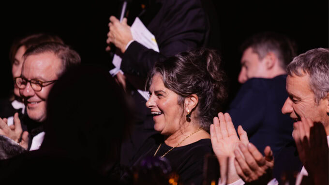 Jeremy Irons and Philip Treacy honored at amfAR London event.