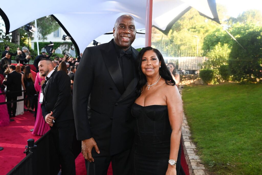 Magic Johnson and Cookie Johnson at the amfAR Gala Cannes.